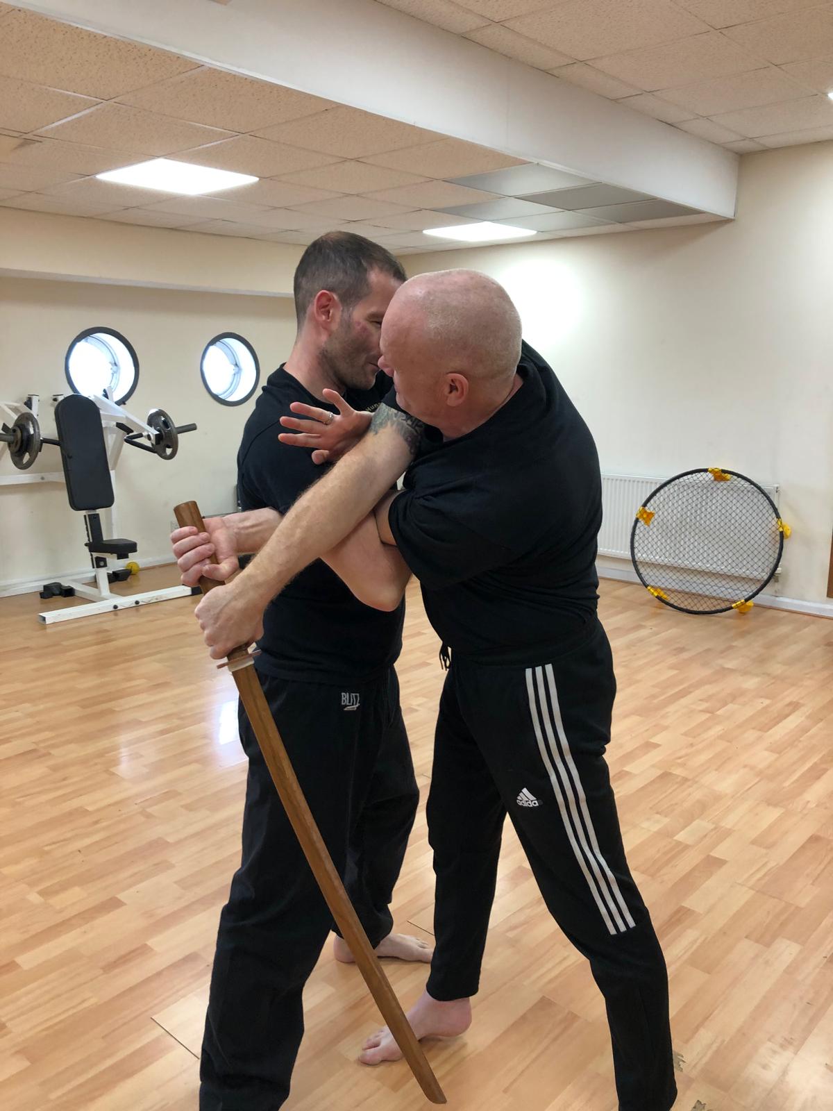 Defending against a side sword attack